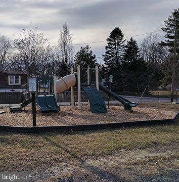 404 Paradise Road Riva, MD 21140 - Photo 43 of 51 a view of a lake with houses