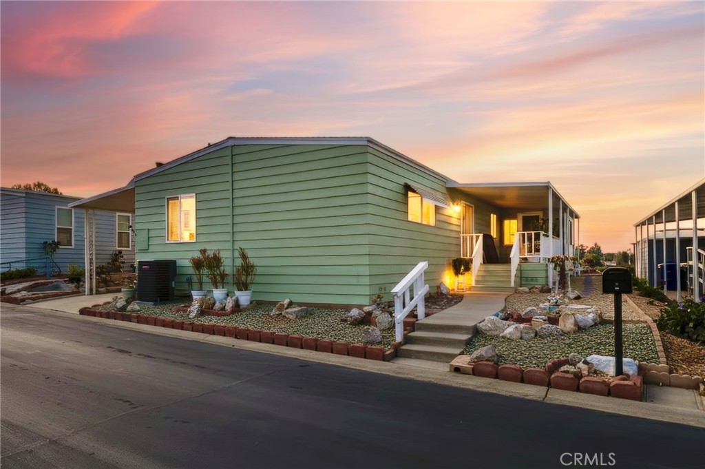 1195 La Moree Road, Unit 36 San Marcos, CA 92078 - Photo 1 of 47 a front view of a house with basket ball court and outdoor seating