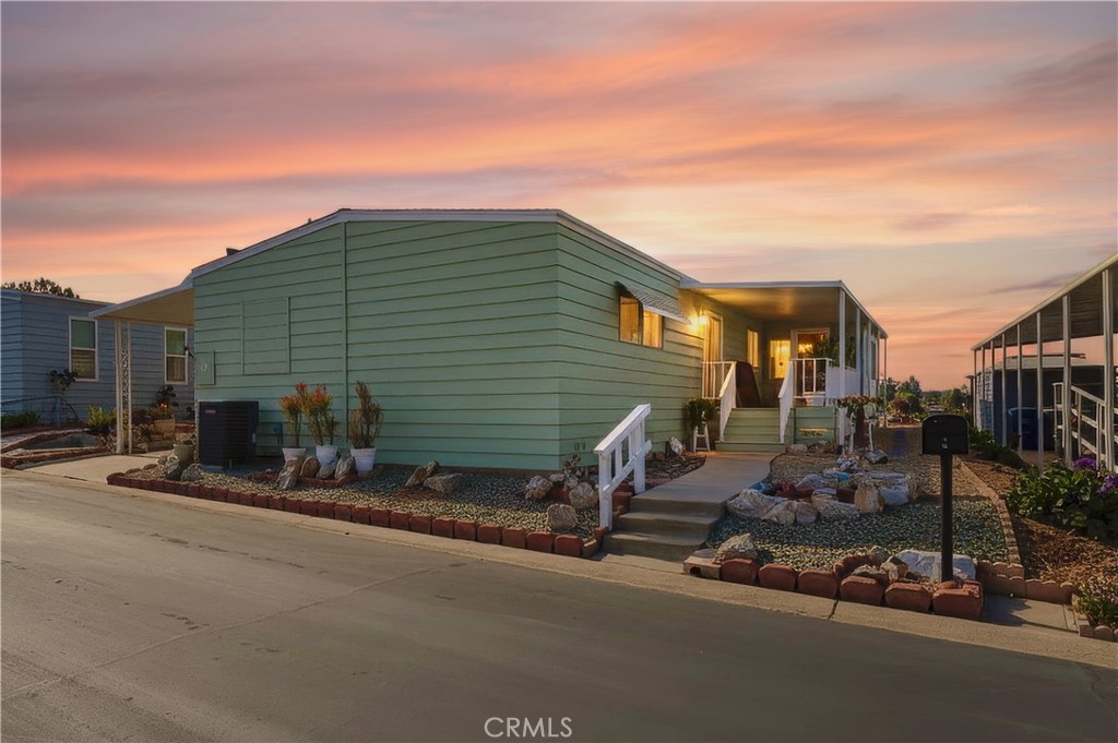 1195 La Moree Road, Unit 36 San Marcos, CA 92078 - Photo 1 of 1 a backyard of a house with table and chairs
