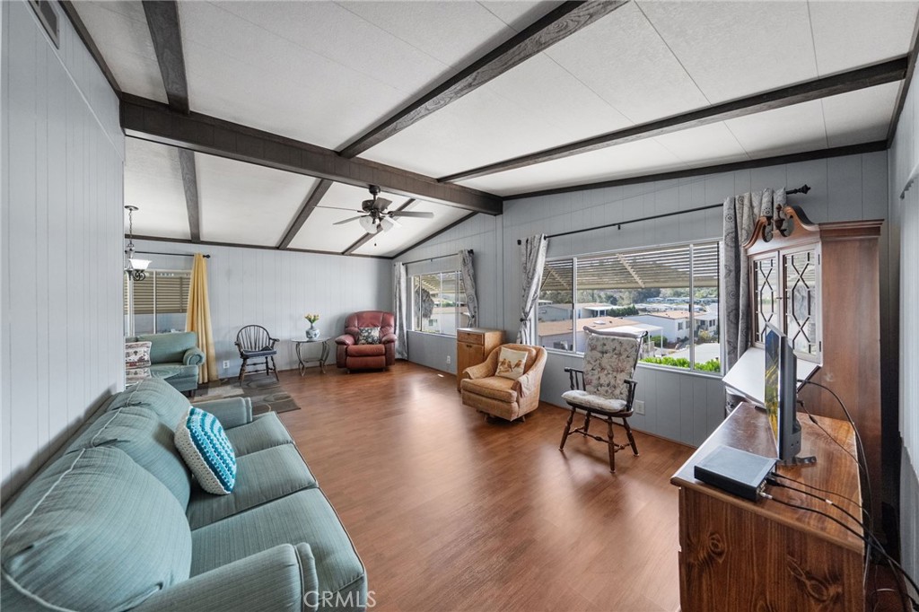 1195 La Moree Road, Unit 36 San Marcos, CA 92078 - Photo 12 of 47 a living room with furniture and a large window