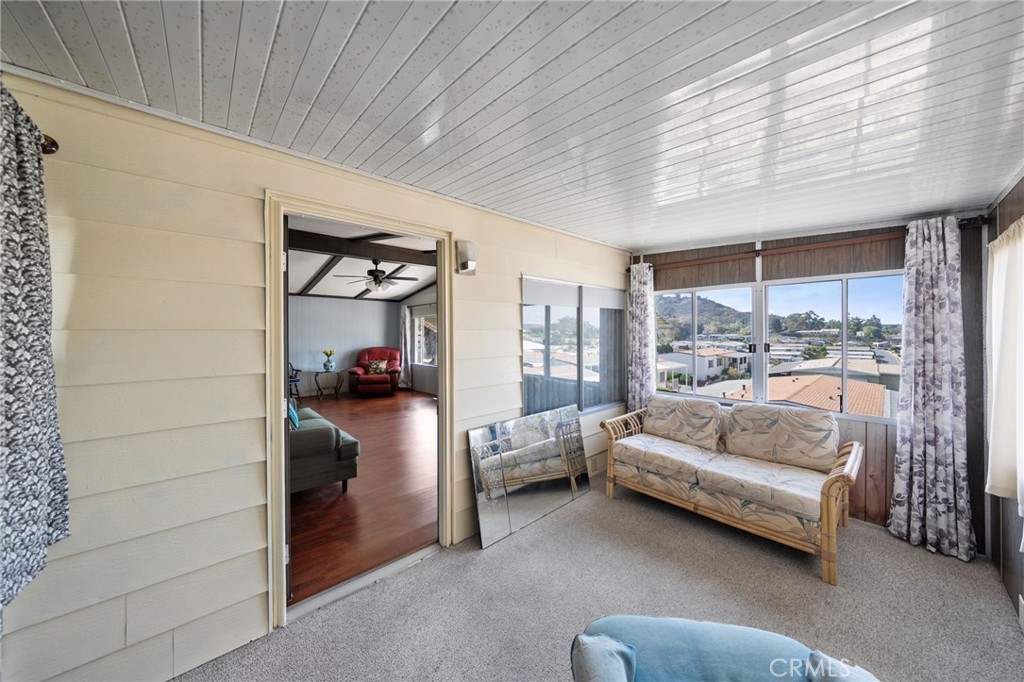 1195 La Moree Road, Unit 36 San Marcos, CA 92078 - Photo 13 of 47 a bedroom with furniture and large window