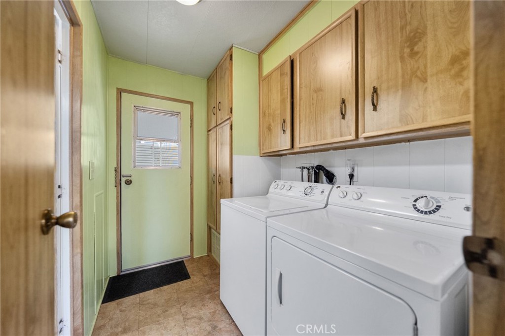 1195 La Moree Road, Unit 36 San Marcos, CA 92078 - Photo 16 of 47 a view of storage and utility room with washer and dryer