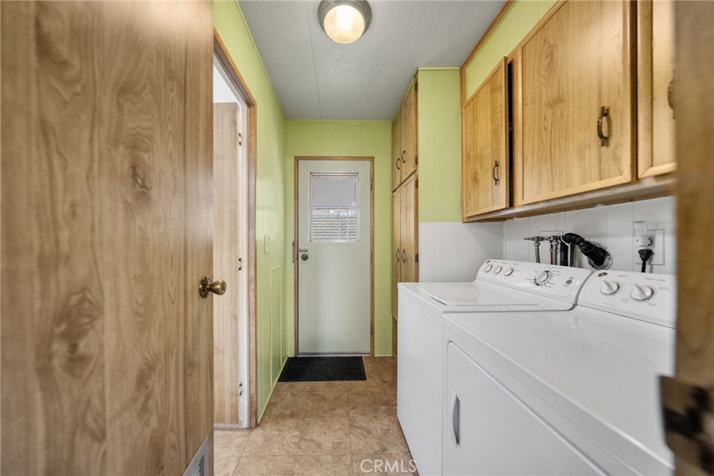 1195 La Moree Road, Unit 36 San Marcos, CA 92078 - Photo 17 of 47 a view of storage and utility room with washer and dryer