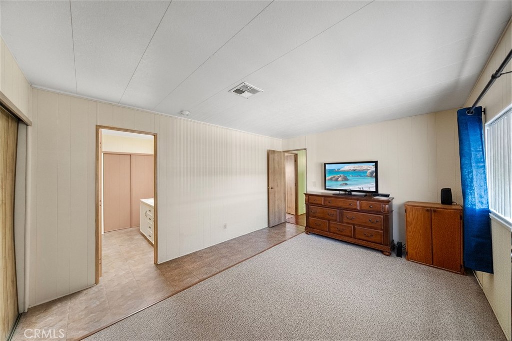 1195 La Moree Road, Unit 36 San Marcos, CA 92078 - Photo 18 of 47 a view of a livingroom with furniture and cabinet