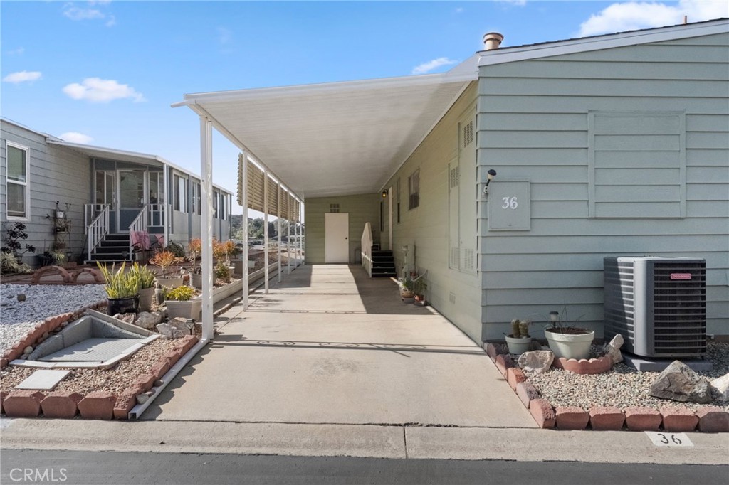 1195 La Moree Road, Unit 36 San Marcos, CA 92078 - Photo 40 of 47 a building exterior with stairs and windows