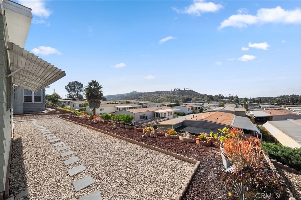 1195 La Moree Road, Unit 36 San Marcos, CA 92078 - Photo 4 of 47 a view of a street with a building in the background