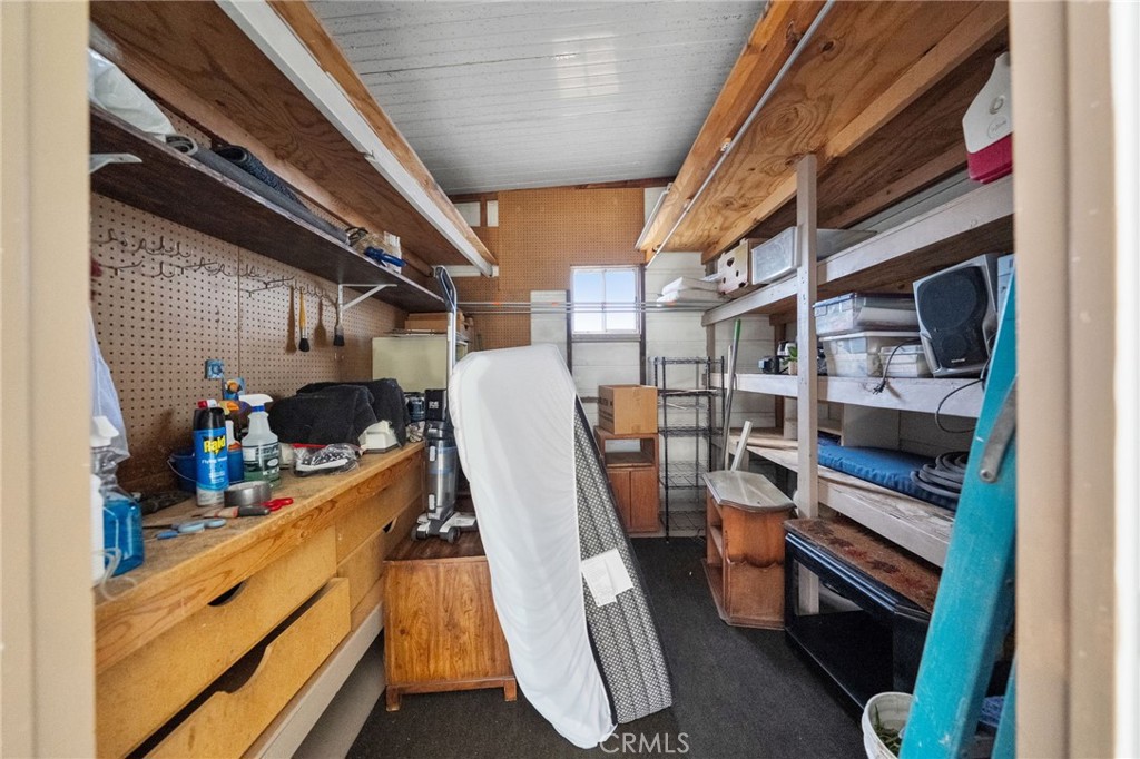 1195 La Moree Road, Unit 36 San Marcos, CA 92078 - Photo 41 of 47 a view of walk in closet with clothes and shoes