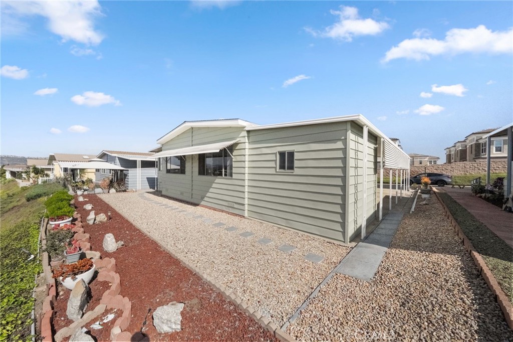 1195 La Moree Road, Unit 36 San Marcos, CA 92078 - Photo 42 of 47 a view of a house with a patio