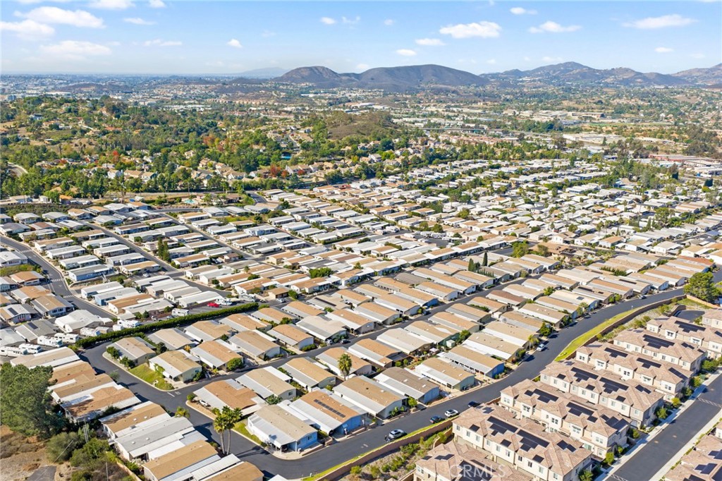 1195 La Moree Road, Unit 36 San Marcos, CA 92078 - Photo 46 of 47 an aerial view of residential building with parking space