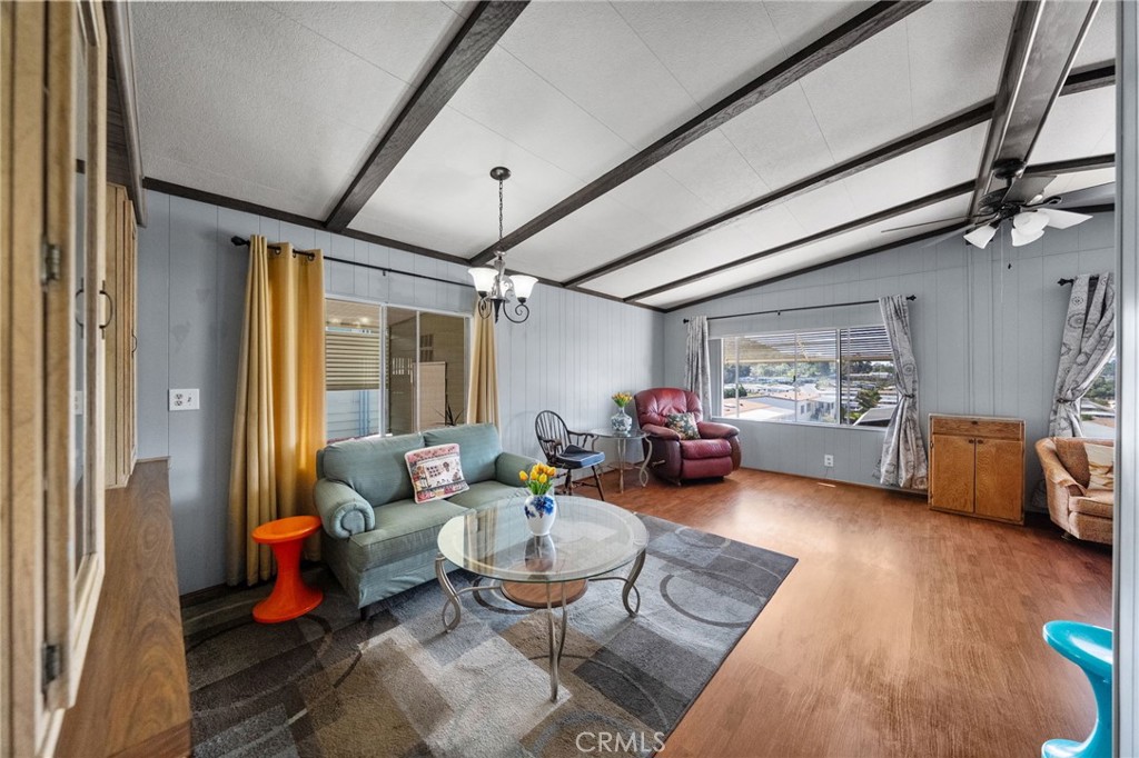 1195 La Moree Road, Unit 36 San Marcos, CA 92078 - Photo 7 of 47 a living room with furniture and a chandelier