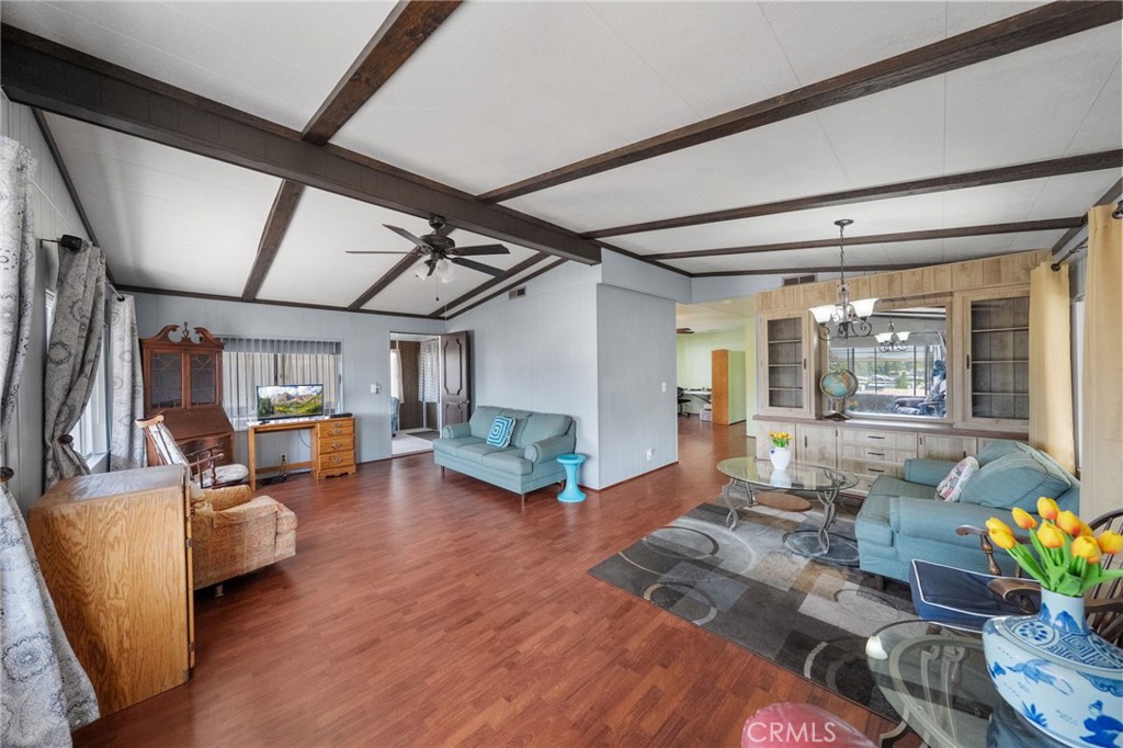 1195 La Moree Road, Unit 36 San Marcos, CA 92078 - Photo 9 of 47 a living room with furniture and a chandelier