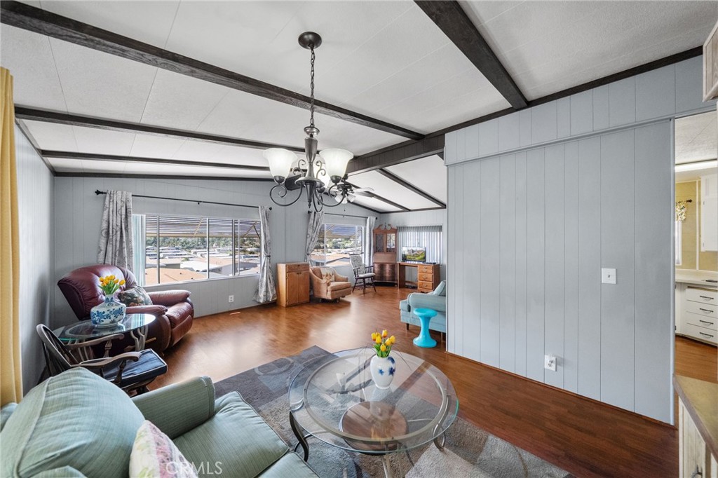 1195 La Moree Road, Unit 36 San Marcos, CA 92078 - Photo 10 of 47 a living room with furniture and a chandelier