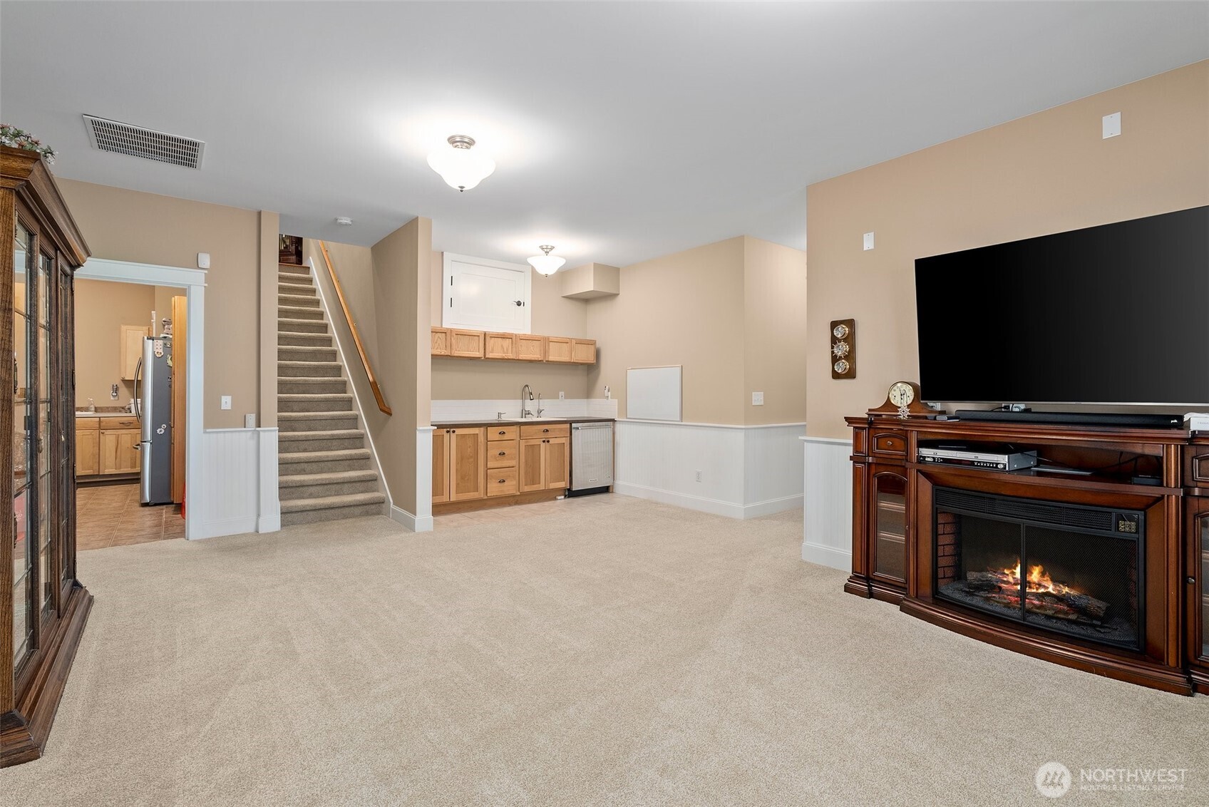 6205 139th Lane Southwest Rochester, WA 98579 - Photo 20 of 39 a view of an empty room with a fireplace and a window