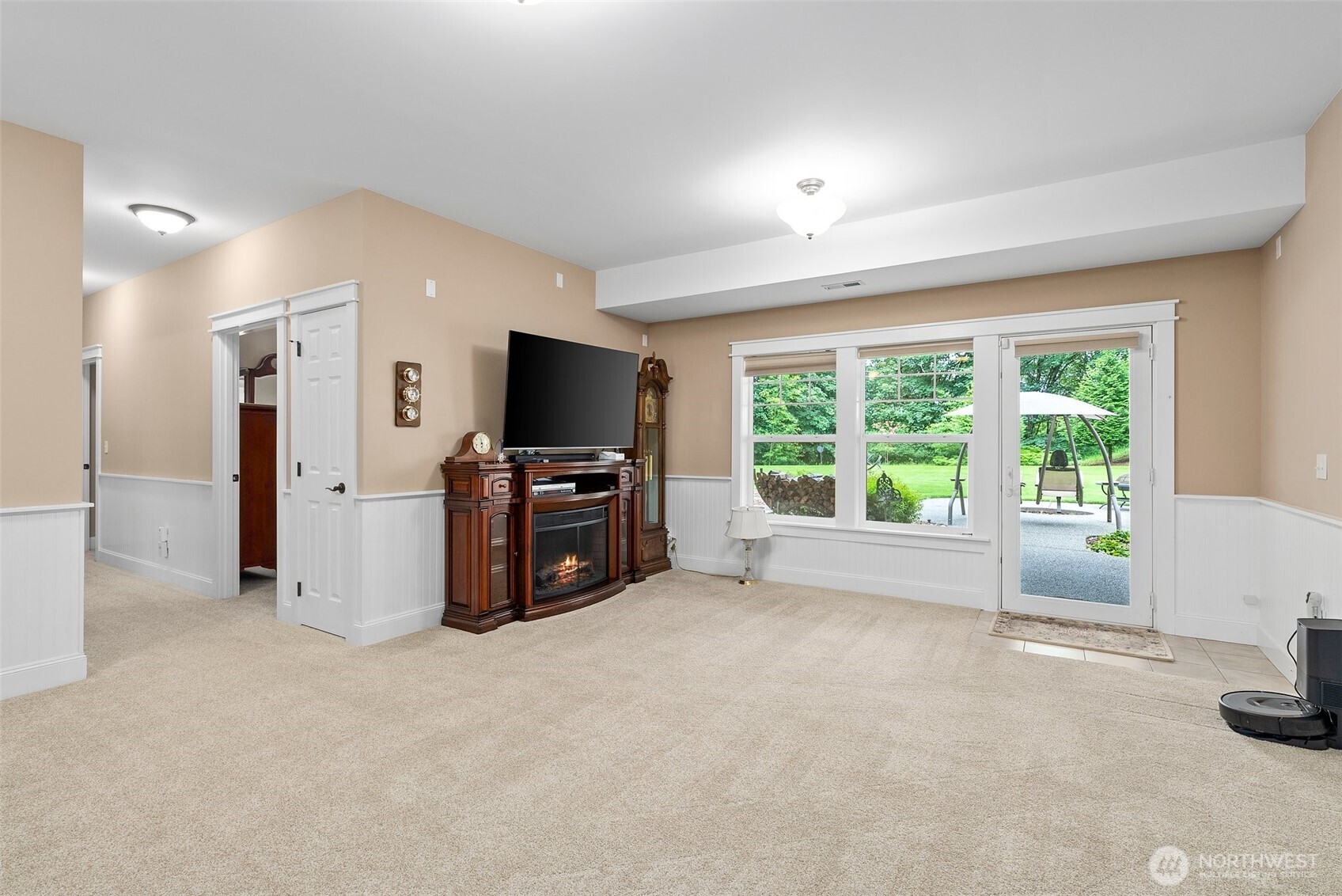6205 139th Lane Southwest Rochester, WA 98579 - Photo 21 of 39 a view of a livingroom with furniture and a flat screen tv