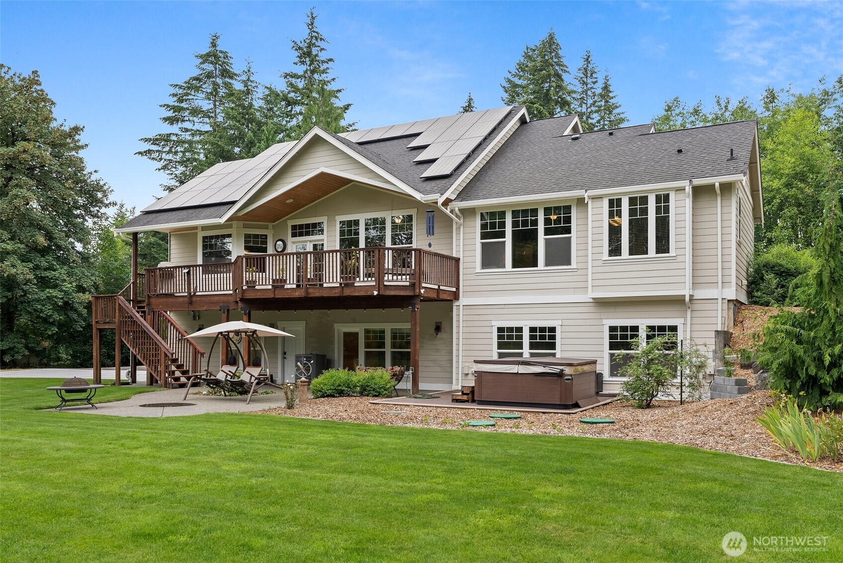 6205 139th Lane Southwest Rochester, WA 98579 - Photo 3 of 39 a front view of a house with a yard