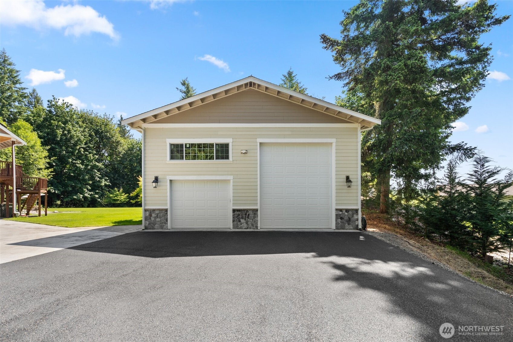 6205 139th Lane Southwest Rochester, WA 98579 - Photo 32 of 39 a view of an house with outdoor space and backyard