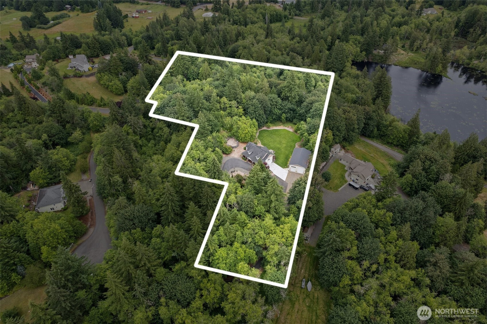 6205 139th Lane Southwest Rochester, WA 98579 - Photo 38 of 39 an aerial view of house with yard