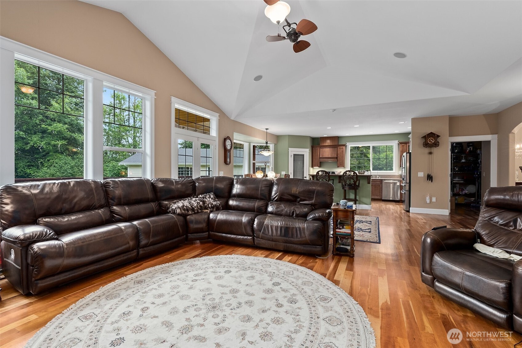 6205 139th Lane Southwest Rochester, WA 98579 - Photo 10 of 39 a living room with furniture wooden floor and a window