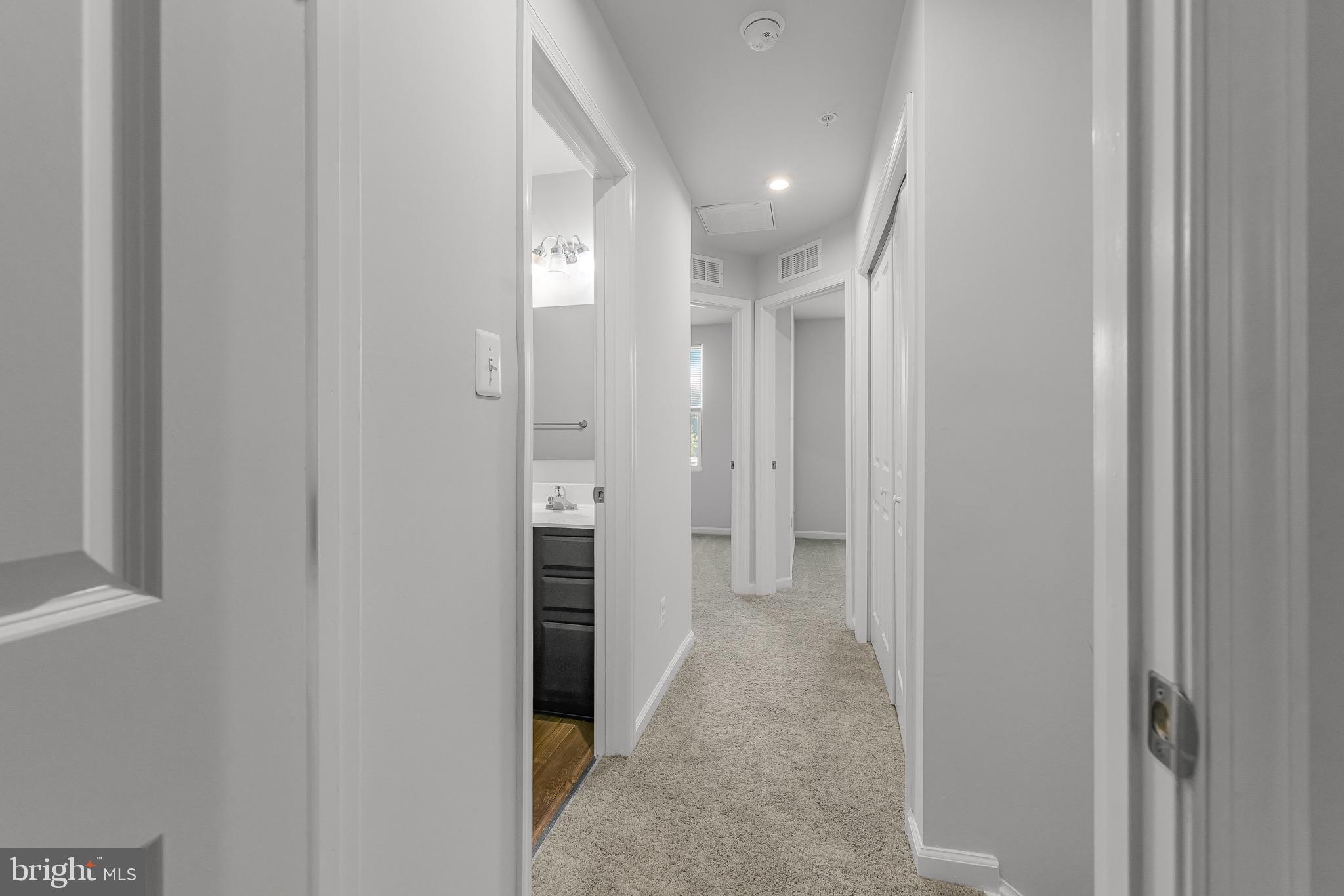 112 Azalea Circle Elkton, MD 21921 - Photo 19 of 34 a view of a hallway with wooden shelves