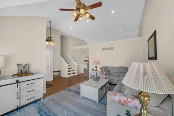 a living room with furniture and a couch