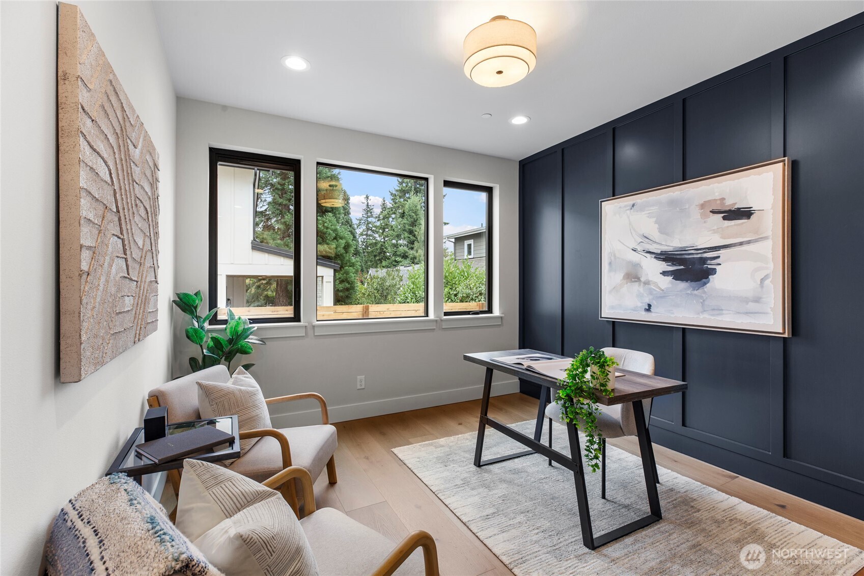 1504 3rd Street Kirkland, WA 98033 - Photo 15 of 36 a living room with furniture and a potted plant