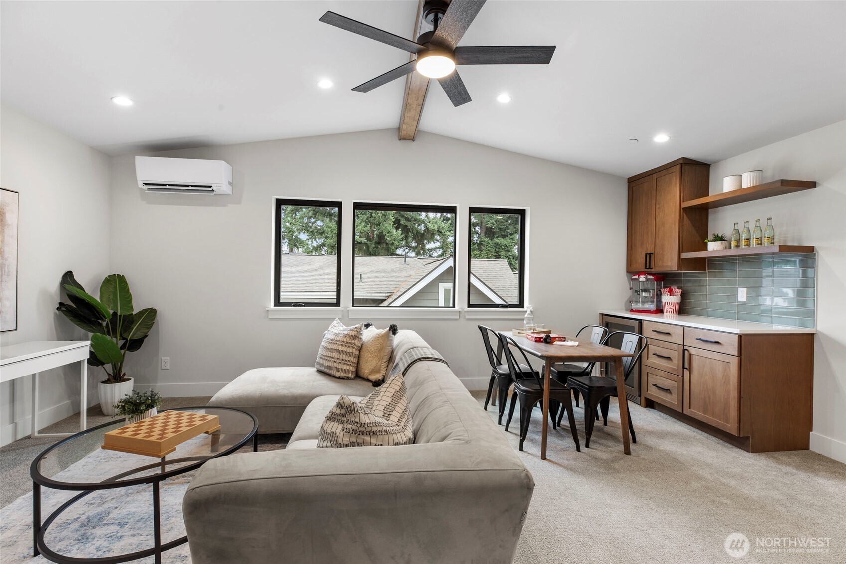 1504 3rd Street Kirkland, WA 98033 - Photo 28 of 36 a living room with furniture and a large window