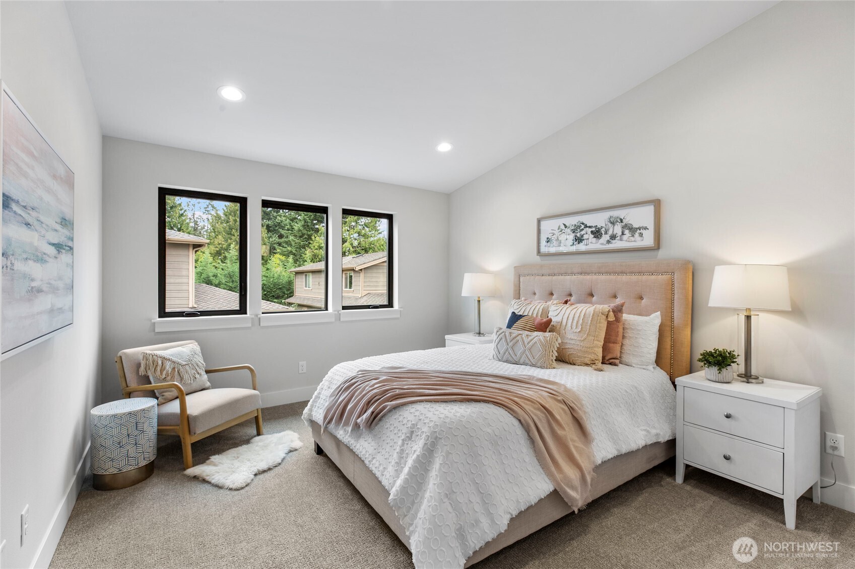 1504 3rd Street Kirkland, WA 98033 - Photo 33 of 36 a bedroom with a bed and a couch