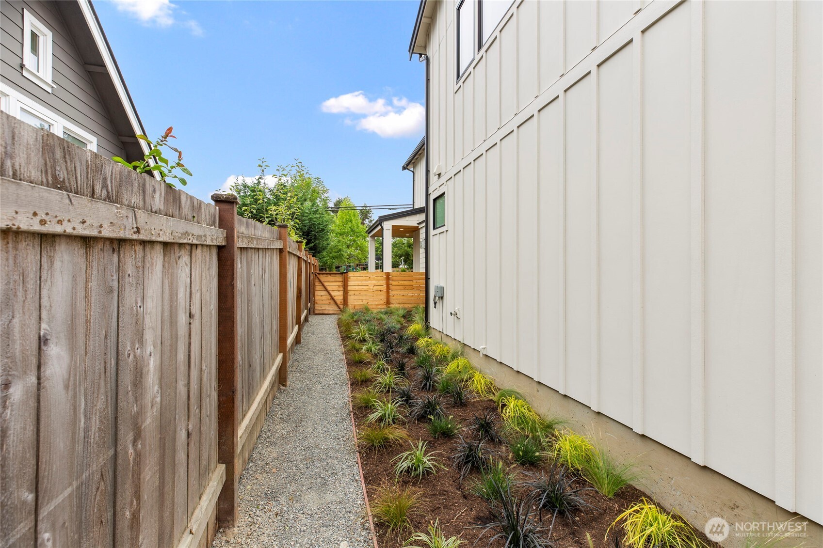 1504 3rd Street Kirkland, WA 98033 - Photo 35 of 36 a view of a pathway of a wooden fence