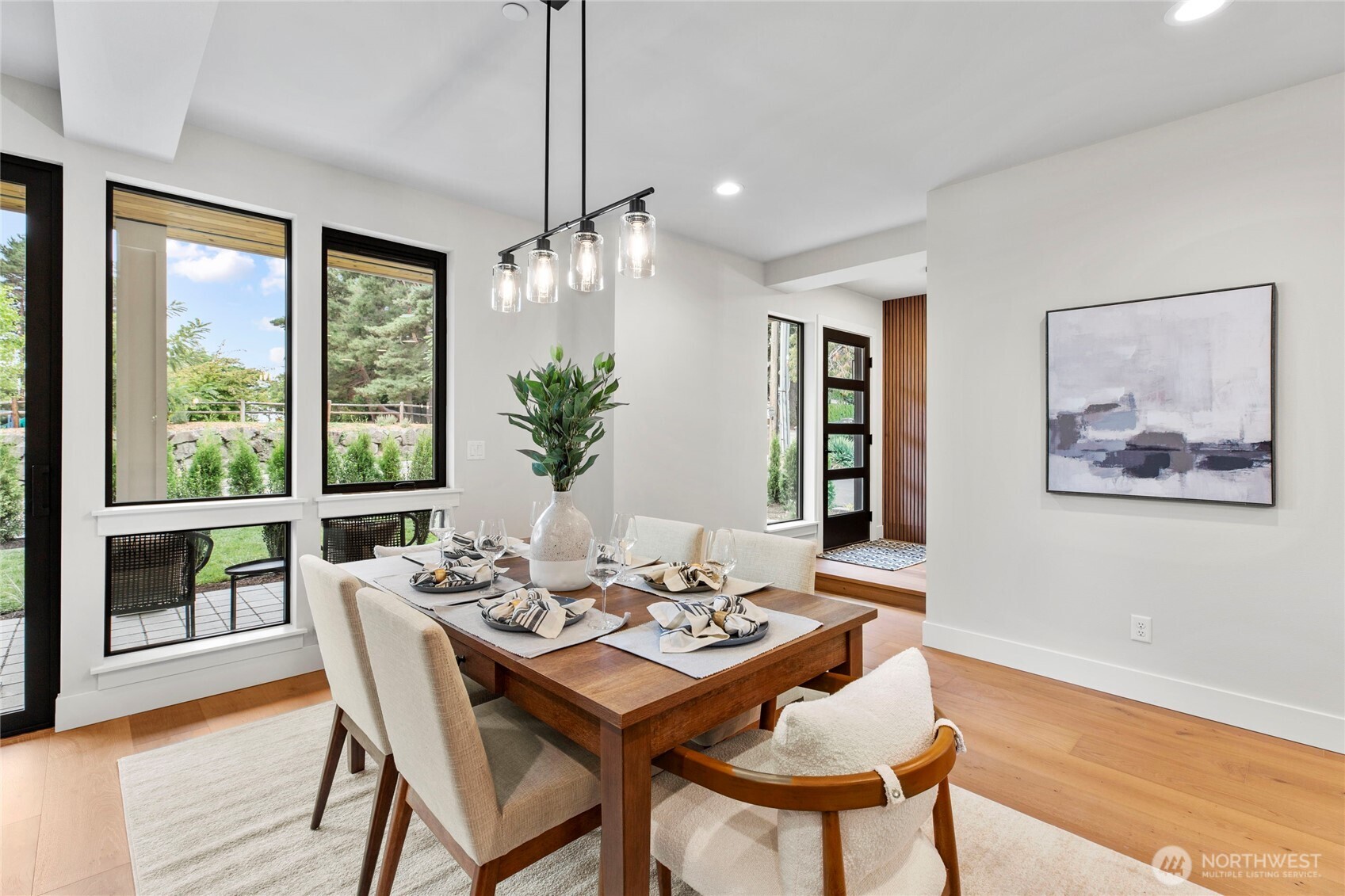1504 3rd Street Kirkland, WA 98033 - Photo 7 of 36 a view of a dining room with furniture window and wooden floor