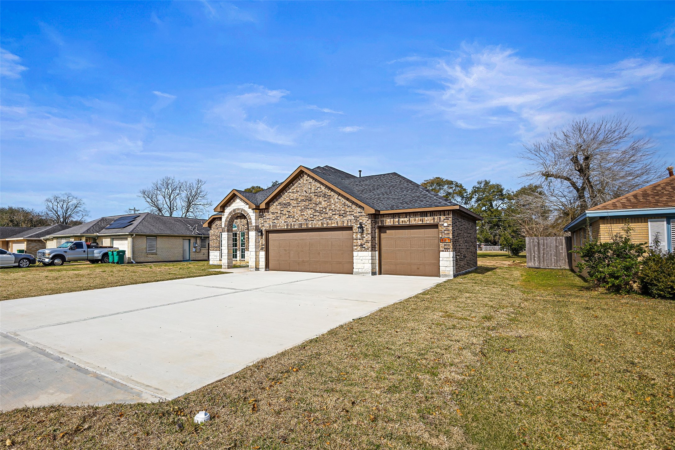 710 Hackberry Street La Marque, TX 77568 - Photo 3 of 41 a front view of a house with a yard and garage