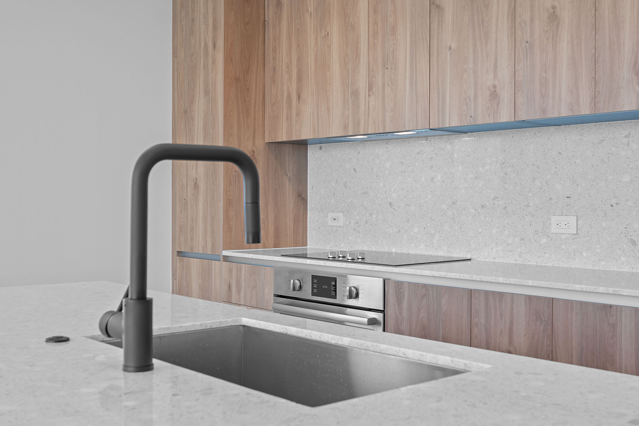 84 East Avenue, Unit 3401 Austin, TX 78701 - Photo 13 of 40 a view of kitchen with stove top oven and cabinets