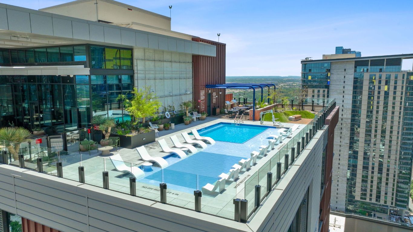 84 East Avenue, Unit 3401 Austin, TX 78701 - Photo 39 of 40 a view of a balcony with chairs