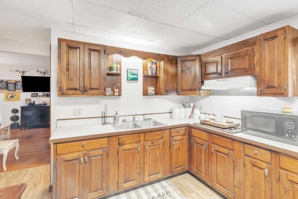 30 Danforth Avenue Pittsfield, MA 01201 - Photo 14 of 25 a kitchen with a sink cabinets and window