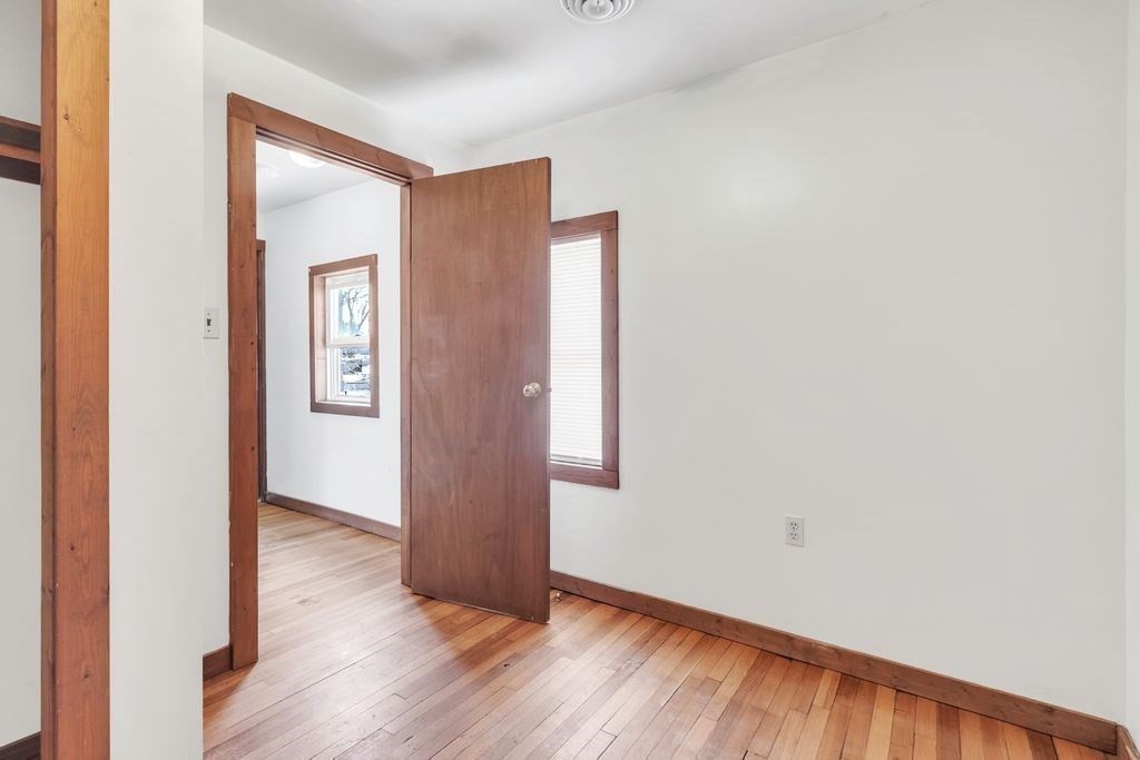 30 Danforth Avenue Pittsfield, MA 01201 - Photo 20 of 25 a view of an empty room with wooden floor and closet
