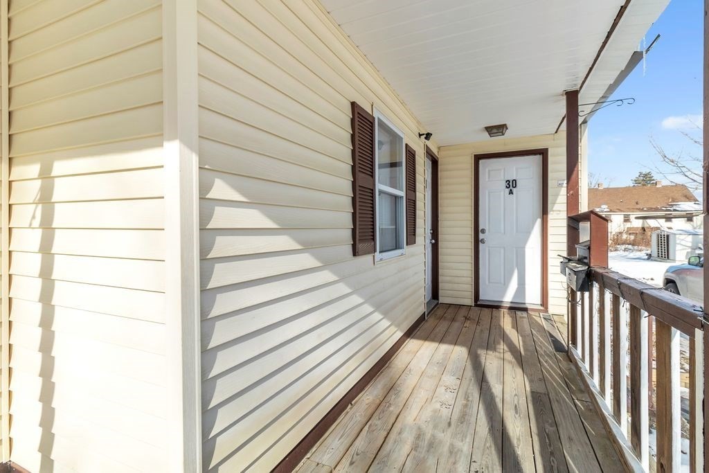 30 Danforth Avenue Pittsfield, MA 01201 - Photo 4 of 25 a view of a balcony with wooden floor