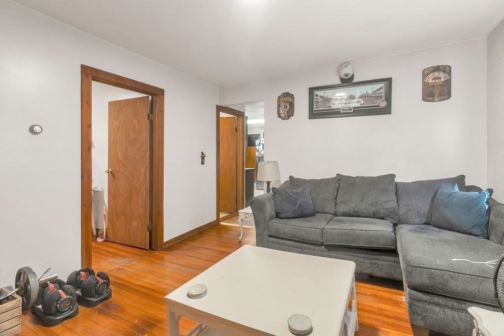30 Danforth Avenue Pittsfield, MA 01201 - Photo 7 of 25 a living room with furniture and a window