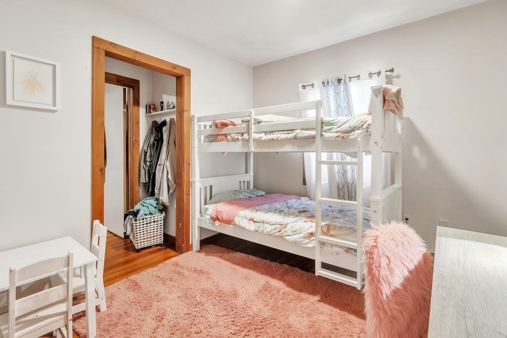 30 Danforth Avenue Pittsfield, MA 01201 - Photo 10 of 25 a bedroom with a bed and a window