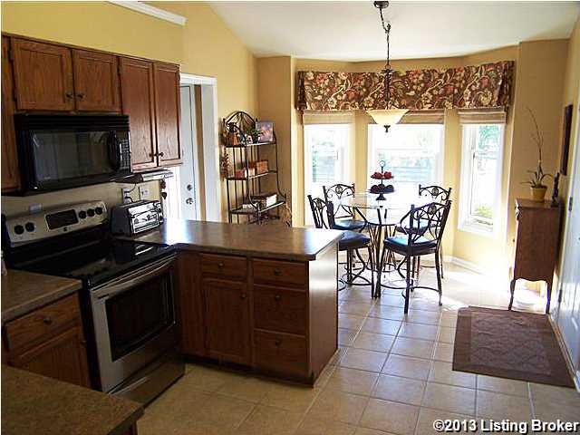 7062 Brunerstown Road Simpsonville, KY 40067 - Photo 20 of 30 Eat-In Kitchen with a large eating area w/a bay window and incredible view out over rolling acres, new light fixture, new counter top, all new Kenmore Elite stainless steel Appliances, vegetable washing sink, pantry, ceramic tile floor and open air wall to the Great Room and Dining Area