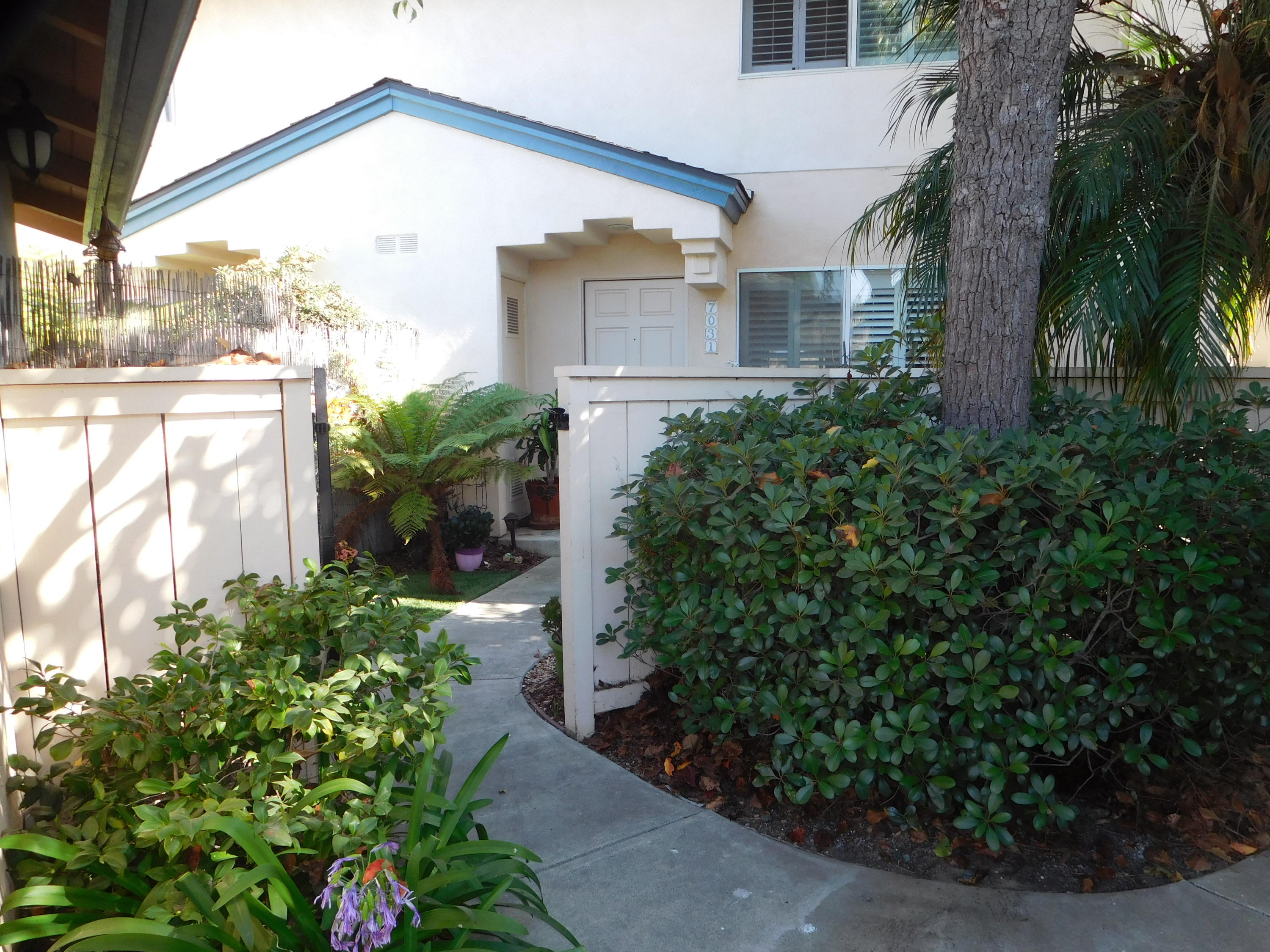 7031 Marymount Way Goleta, CA 93117 - Photo 1 of 9 a front view of a house with a yard