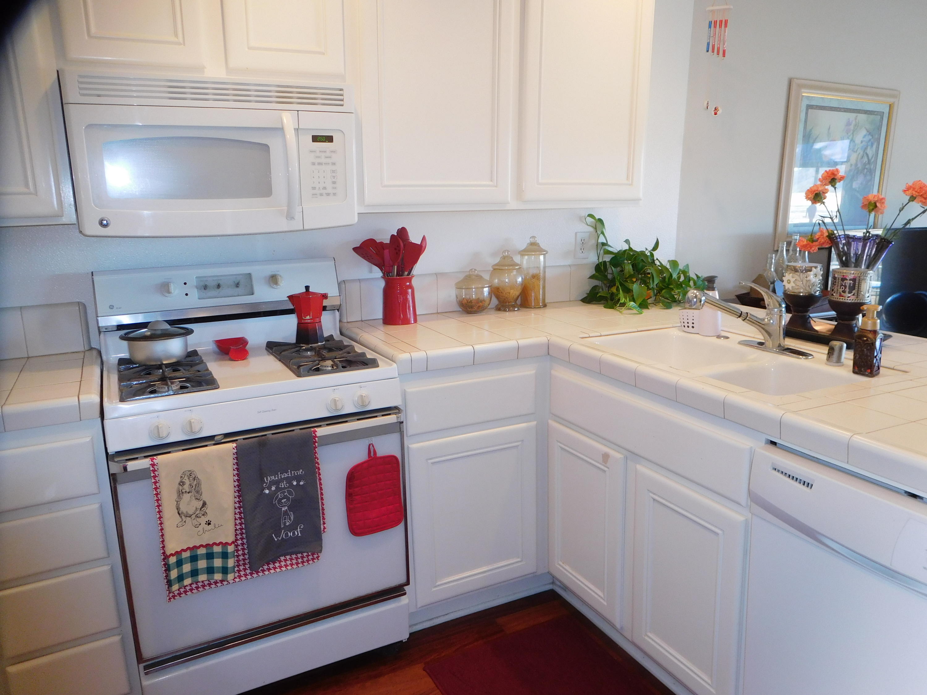 7031 Marymount Way Goleta, CA 93117 - Photo 2 of 9 a kitchen with a sink cabinets and appliances