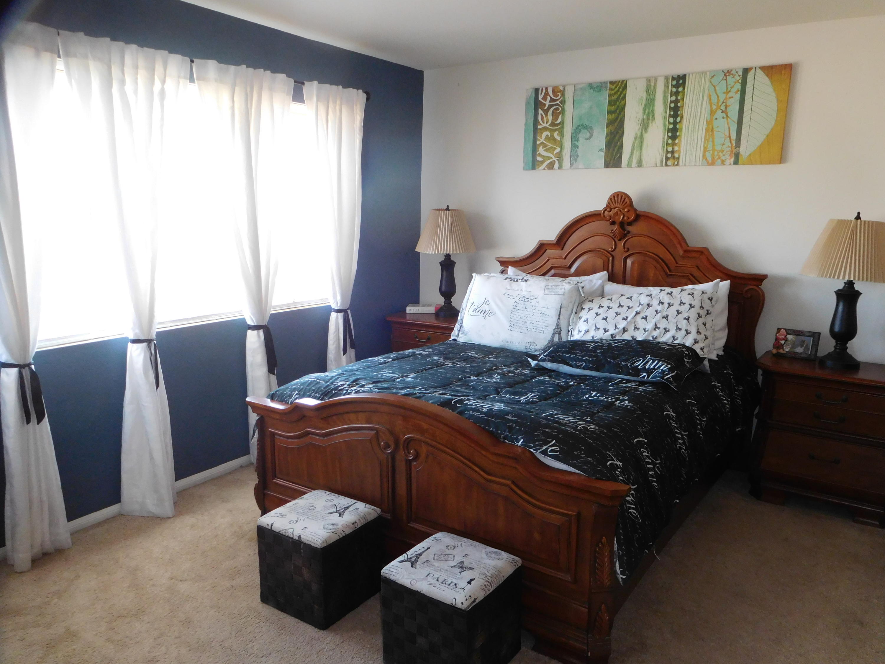 7031 Marymount Way Goleta, CA 93117 - Photo 5 of 9 a bedroom with a bed and dresser