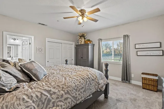 a bathroom with a shower and a toilet