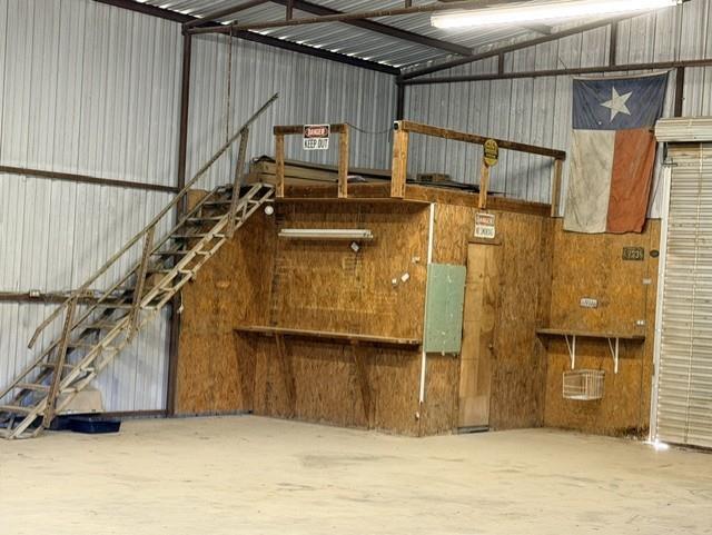 4316 Leona Road Bowie, TX 76230 - Photo 26 of 37 a view of a balcony with wooden floor