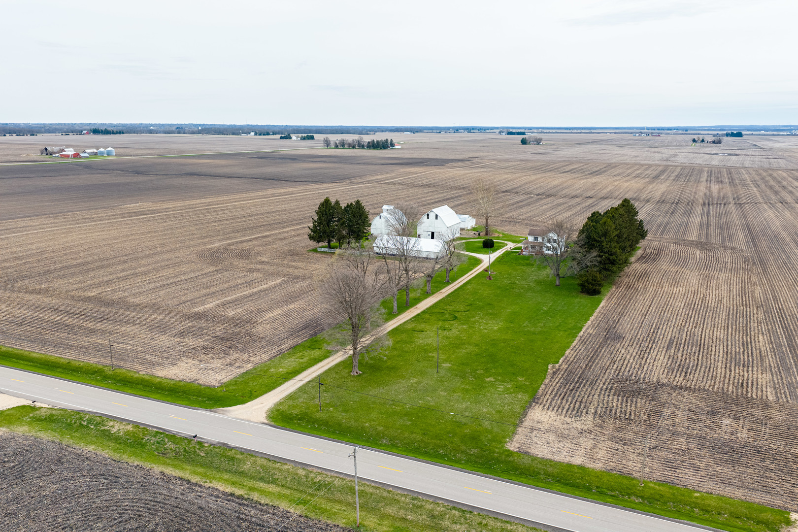 16606 West Backbone Road Princeton, IL 61356 - Photo 36 of 40 a view of a lake from a yard