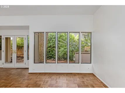 a kitchen with white cabinets