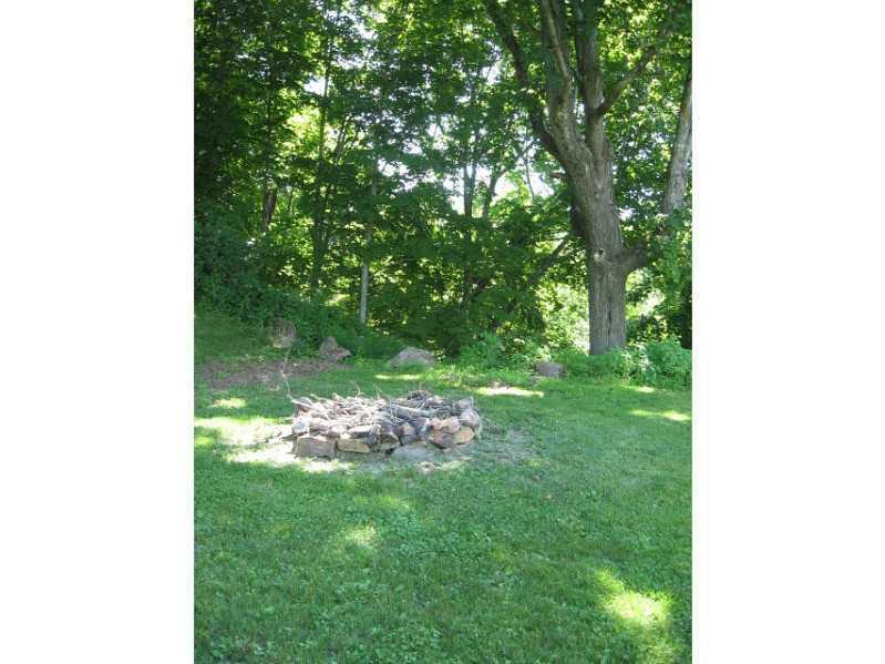 800 Dirigo Road South China, ME 04358 - Photo 13 of 15 Yard/Garden. Fire pit for s mores!!