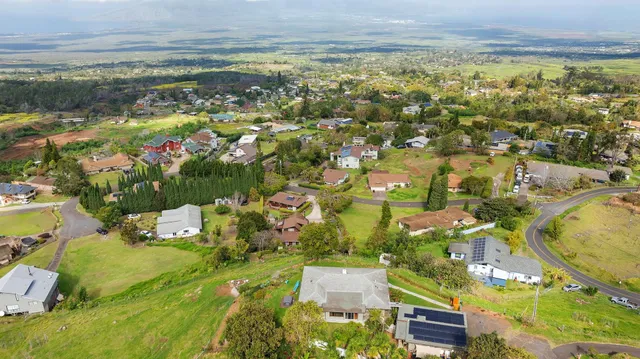 a balcony with table and chairs