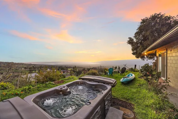 a view of a backyard of a house