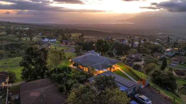 an aerial view of house with outdoor space