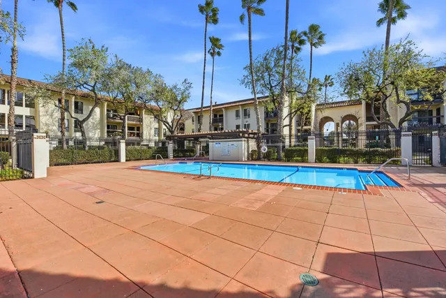a view of balcony with wooden floor
